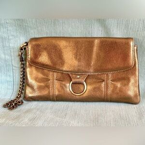 EUC Leather bronze clutch with dark gold wrist chain